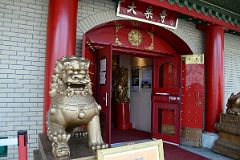 13-2 A Golden Lion Guards The Entrance To Mahayana Buddhist Temple At 133 Canal St In Chinatown New York City.jpg
